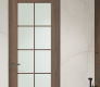 Avon 10 Lite Vetro Pecan Nutwood Modern Interior Frameless Door by Belldinni