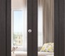 Avon 207 Clear Vetro Veralinga Oak Modern Interior Bifold Doors by Belldinni