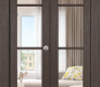 Avon 4 Lite Clear Vetro Veralinga Oak Modern Interior Bifold Doors by Belldinni