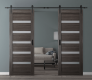 DOUBLE BARN DOOR LEORA VETRO GRAY OAK 72" X 84" X 1 9/16" BLACK HARDWARE
